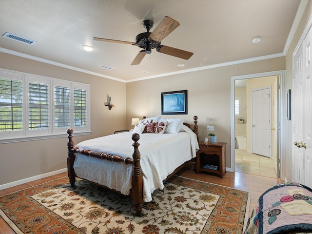 bedroom with ceiling fan, ornamental molding, and light wood-type flooring