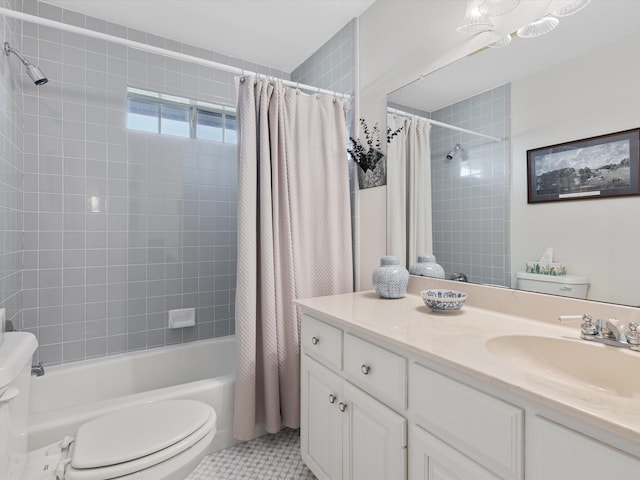 full bathroom with vanity, shower / tub combo with curtain, tile patterned floors, and toilet