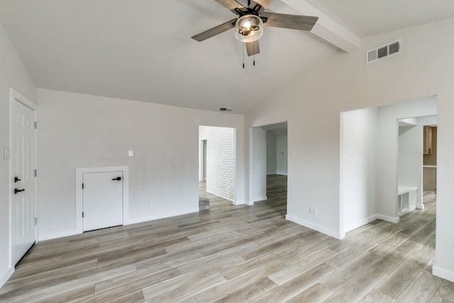 spare room featuring high vaulted ceiling, light wood-type flooring, and ceiling fan