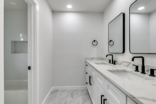 bathroom featuring dual vanity and tile patterned floors