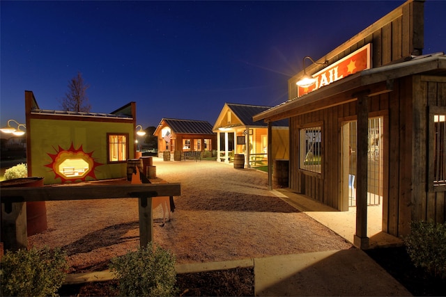 view of property exterior at twilight