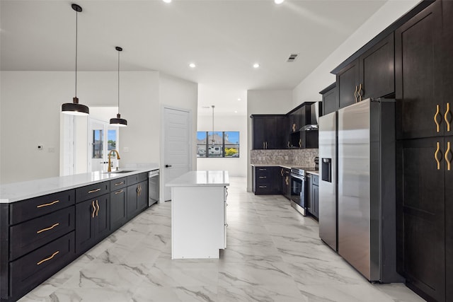 1057 Meadow Hill Dr, Lavon, TX 75166 - kitchen with stainless steel appliances, a center island, decorative backsplash, a peninsula, and a sink