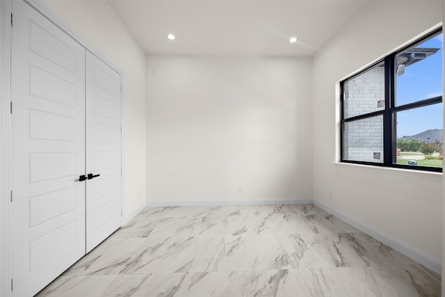 1057 Meadow Hill Dr, Lavon, TX 75166 - unfurnished bedroom with light marble finish floors, baseboards, and recessed lighting