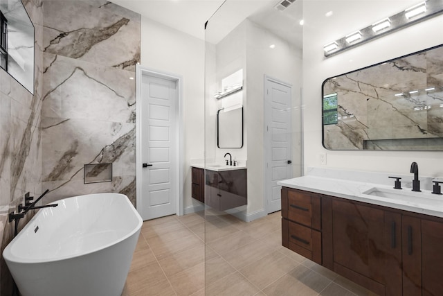 1057 Meadow Hill Dr, Lavon, TX 75166 - full bath featuring a freestanding tub, vanity, tile patterned flooring, and a walk in shower
