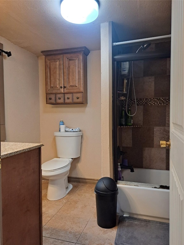 full bathroom with tile patterned floors, vanity, a textured ceiling, and toilet