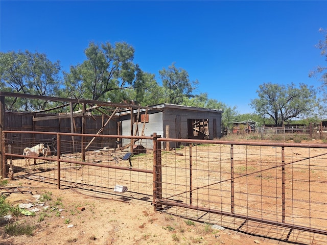 exterior space featuring an outbuilding