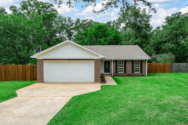 ranch-style house featuring a garage and a front yard