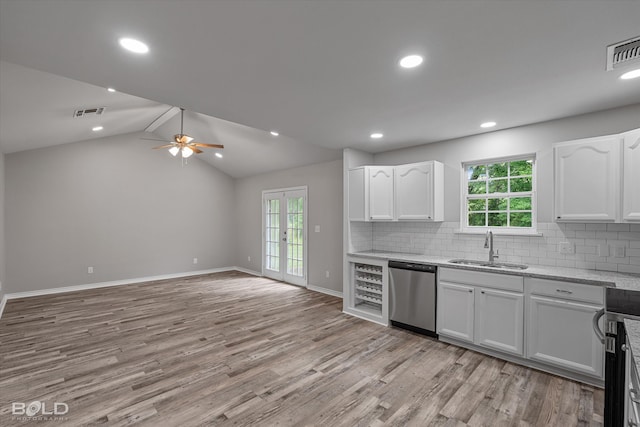 kitchen with ceiling fan, stainless steel appliances, white cabinetry, and sink