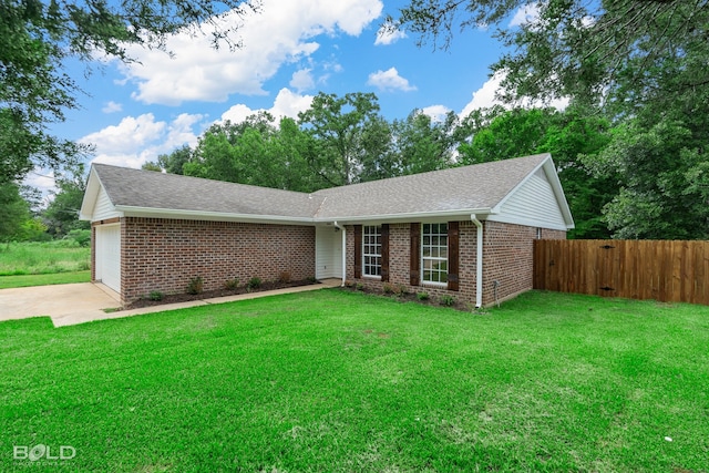 ranch-style house with a garage and a front lawn