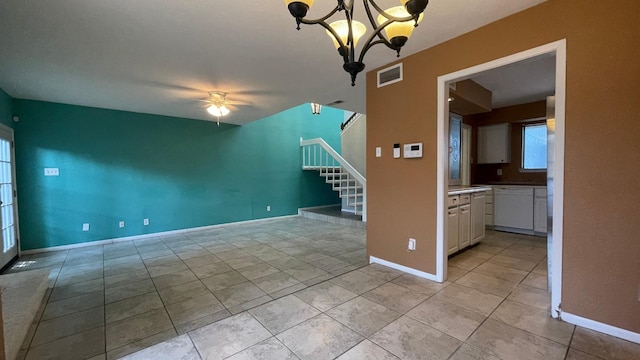 unfurnished living room featuring light tile patterned floors and ceiling fan with notable chandelier