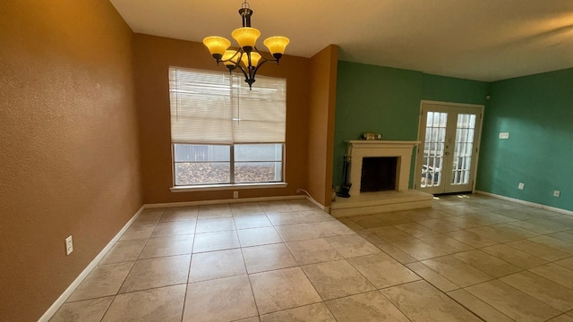 unfurnished living room with light tile patterned floors and a chandelier