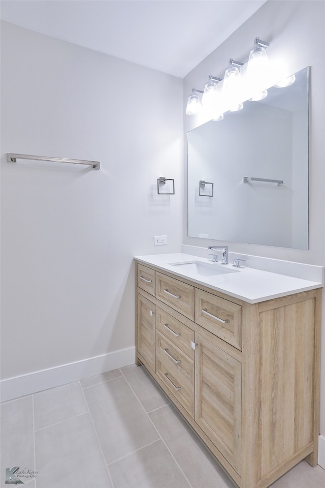 bathroom featuring vanity and tile patterned floors