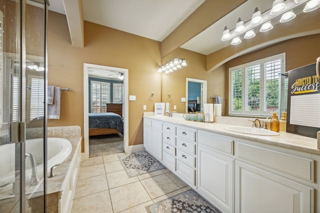 bathroom featuring tile patterned flooring, vanity, separate shower and tub, and ceiling fan