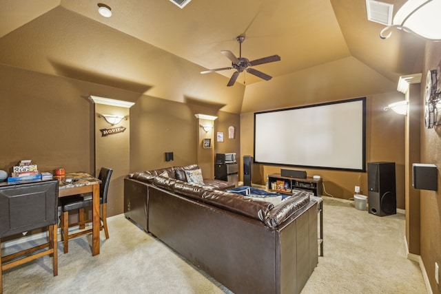 home theater room with light carpet, ceiling fan, and lofted ceiling