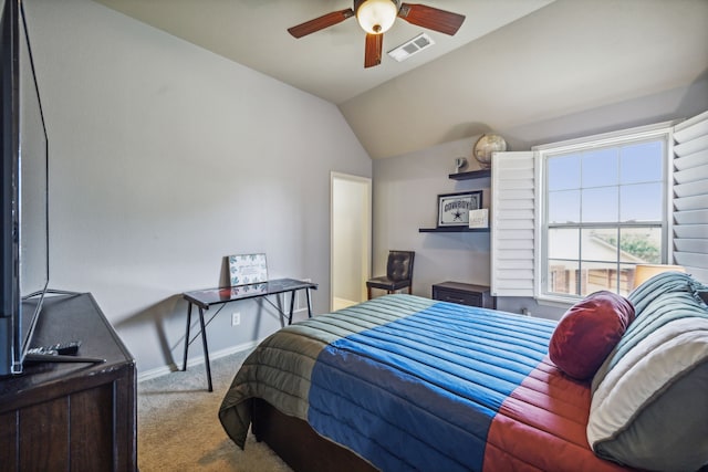 carpeted bedroom with ceiling fan and lofted ceiling