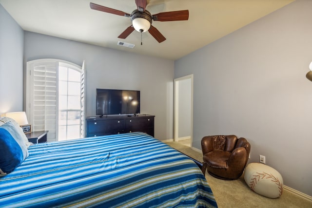 bedroom featuring carpet flooring and ceiling fan