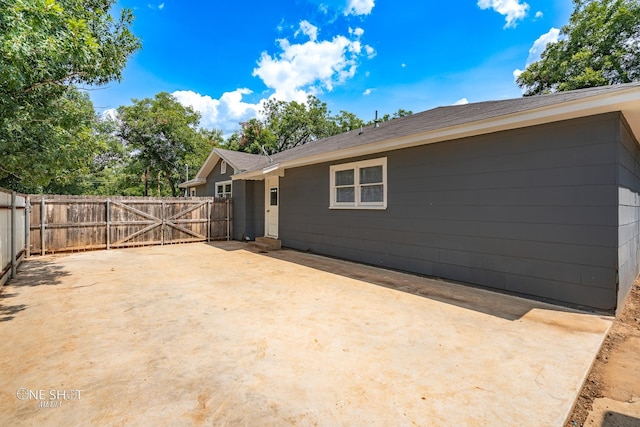 rear view of property with a patio