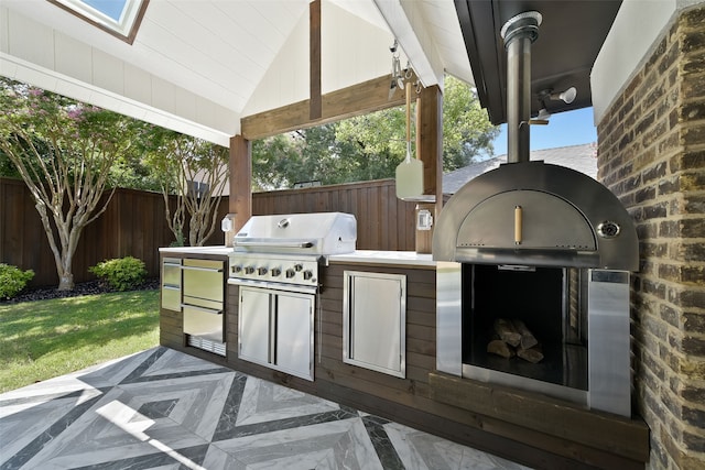 view of patio / terrace featuring grilling area and exterior kitchen