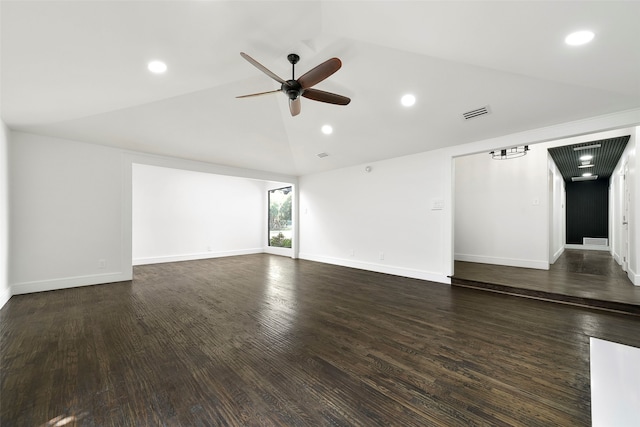 unfurnished room with dark hardwood / wood-style floors, ceiling fan, and lofted ceiling