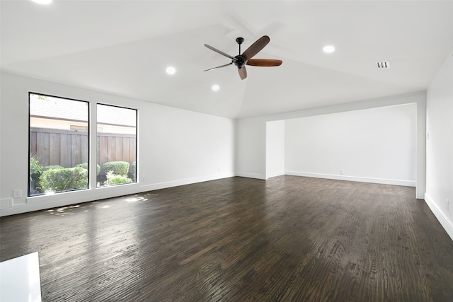 unfurnished room featuring ceiling fan, dark hardwood / wood-style flooring, and lofted ceiling