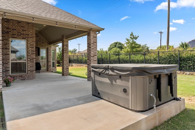 view of patio / terrace featuring a hot tub