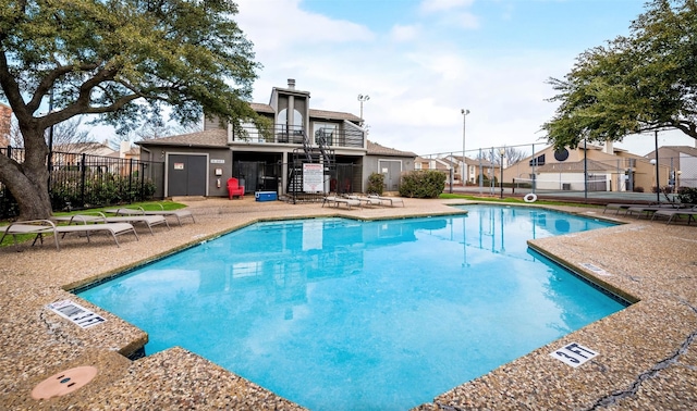 view of swimming pool featuring a patio