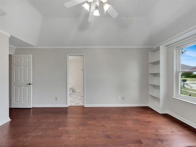 unfurnished room featuring a healthy amount of sunlight, ornamental molding, hardwood / wood-style floors, and ceiling fan