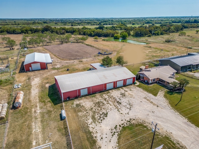 bird's eye view featuring a rural view and a water view