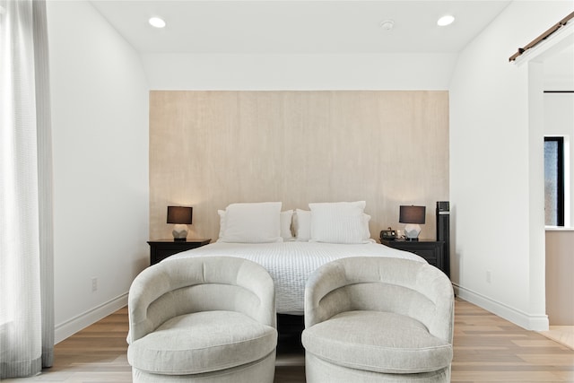 bedroom featuring light wood-type flooring