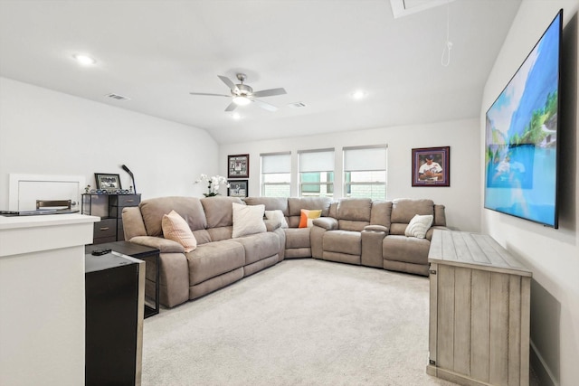 living room with ceiling fan and light carpet