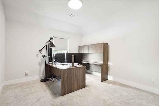 home office featuring light colored carpet