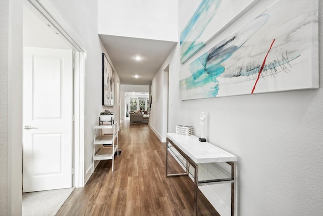 hallway featuring dark wood-type flooring