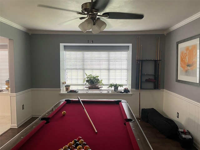 game room with dark hardwood / wood-style flooring, crown molding, pool table, and ceiling fan