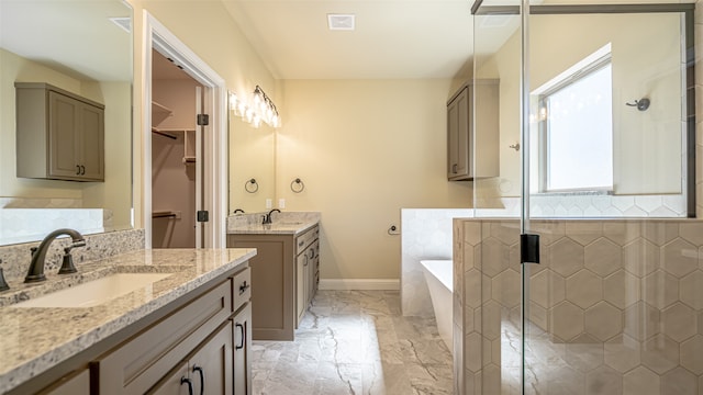 bathroom with plus walk in shower and vanity