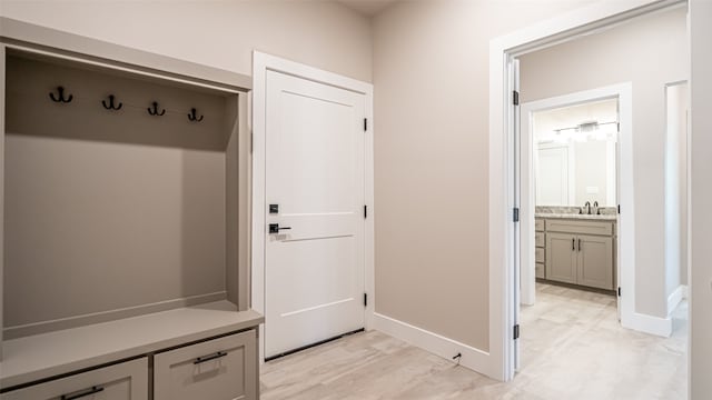 mudroom with sink