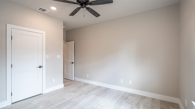 unfurnished bedroom with ceiling fan and light hardwood / wood-style flooring