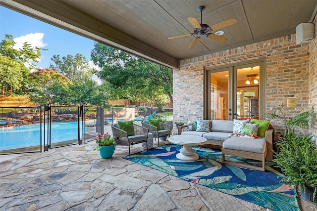 view of patio featuring a fenced in pool, an outdoor hangout area, and ceiling fan