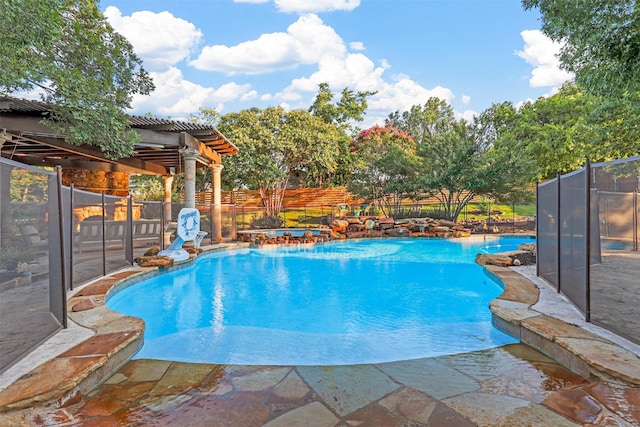 view of pool with a pergola and a patio area