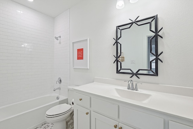 full bathroom featuring tiled shower / bath combo, tile patterned flooring, toilet, and vanity