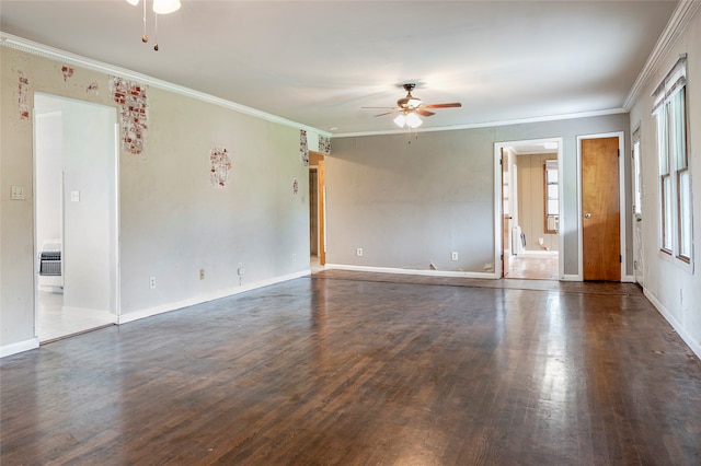 unfurnished room with dark hardwood / wood-style flooring, heating unit, ceiling fan, and ornamental molding