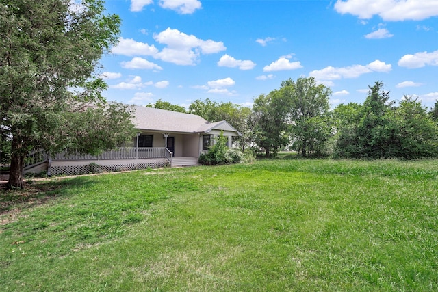 view of yard featuring a porch