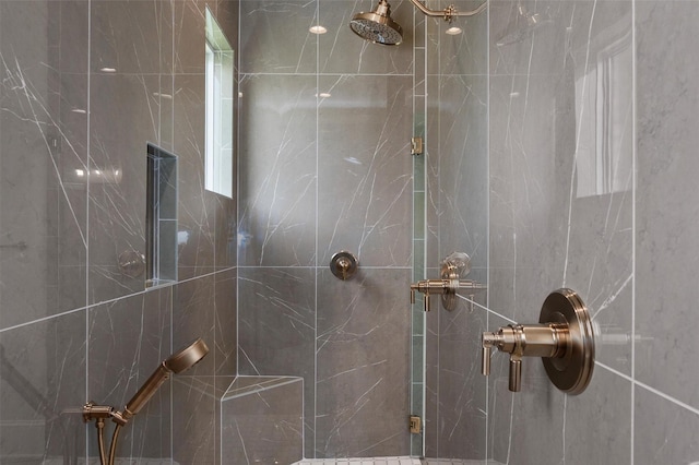 bathroom featuring an enclosed shower