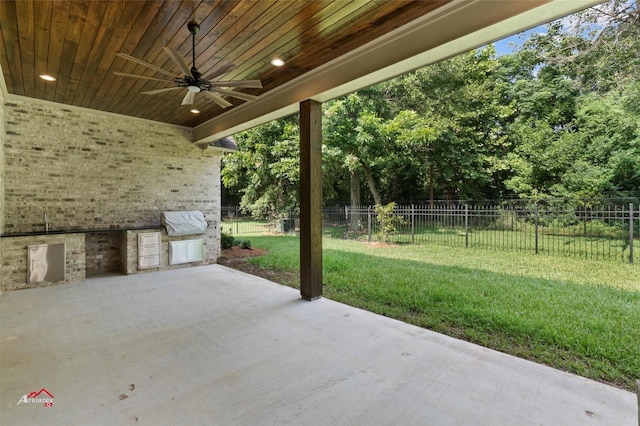 view of patio / terrace with ceiling fan and area for grilling