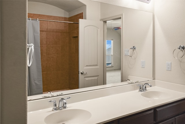 bathroom with vanity and a shower with curtain