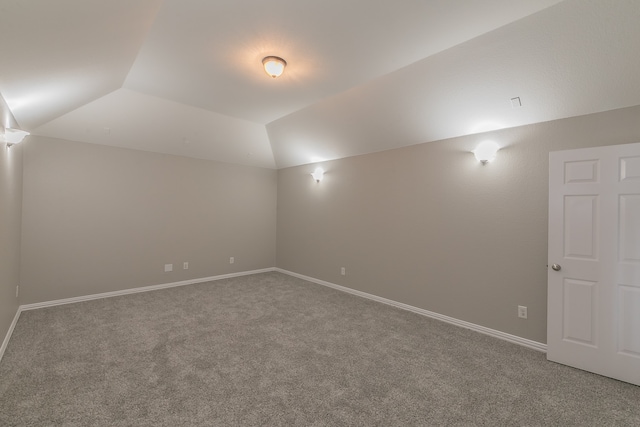 bonus room featuring carpet floors and lofted ceiling