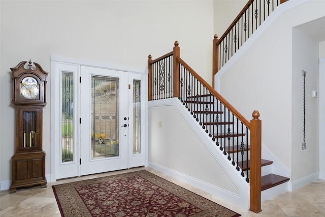 foyer entrance featuring light tile patterned floors