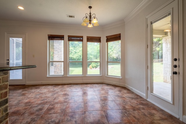 unfurnished dining area with a chandelier and ornamental molding