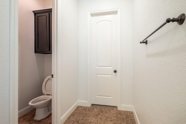 bathroom featuring toilet