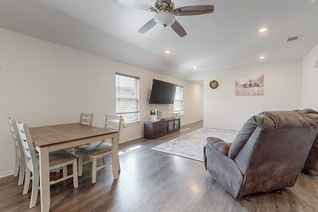 living room with hardwood / wood-style floors and ceiling fan