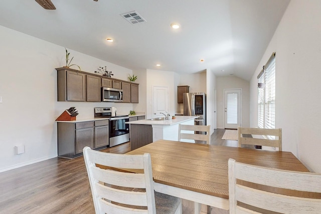 living room featuring light hardwood / wood-style floors and ceiling fan